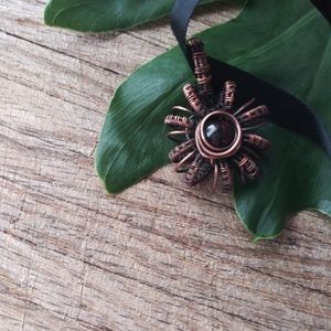 Woven Floral Pendant with Garnet